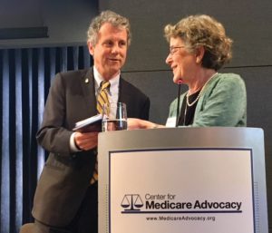 Center for Medicare Advocacy founder and executive director, Judith Stein, honors Senator Sherrod Brown who presented the Senator Jay Rockefeller Lecture as part of the center's 2017 National Voices of Medicare Summit. (Photo courtesy of CMA.)