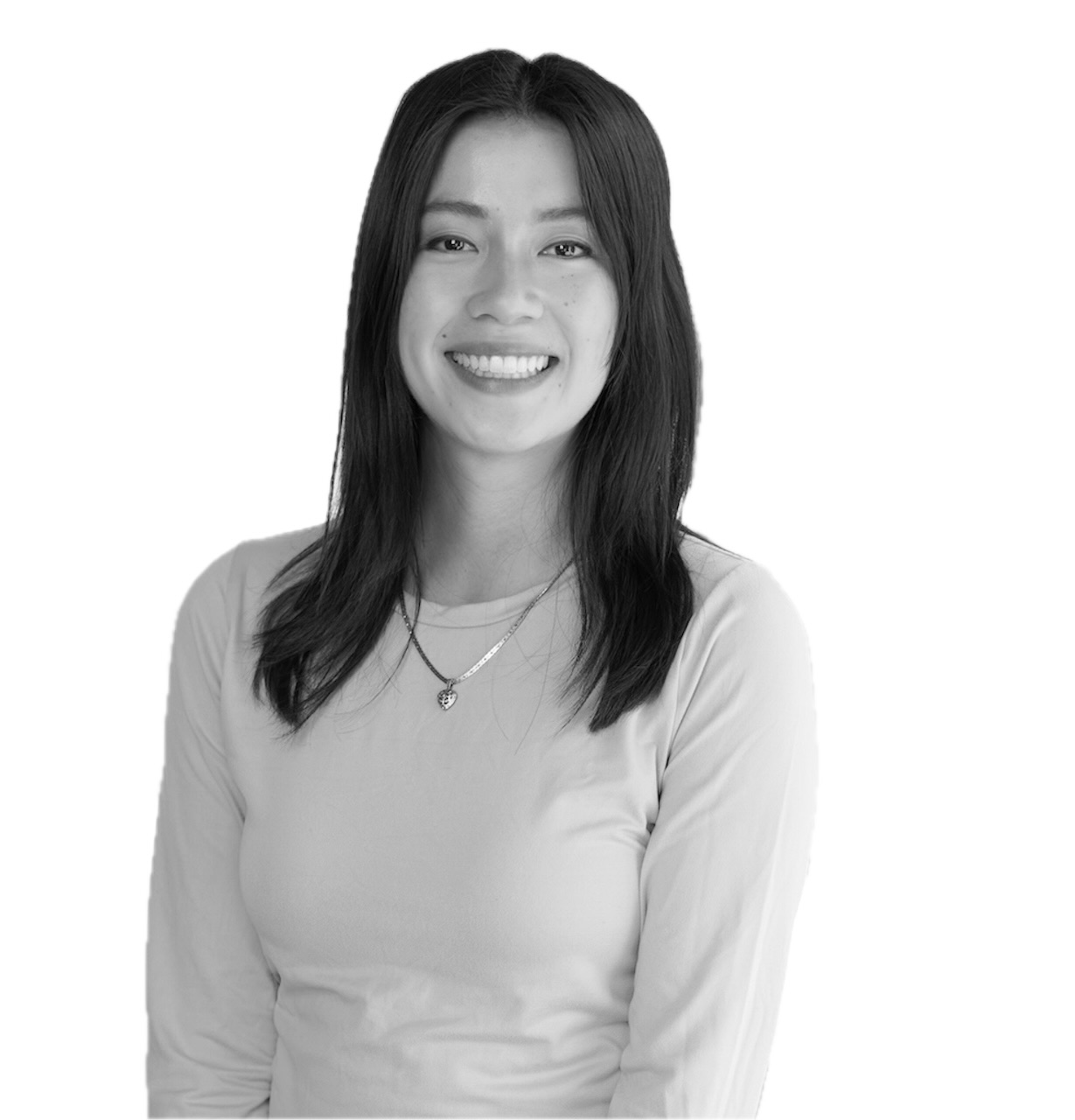 Smiling woman with shoulder-length dark hair in a light top, posed for a head-and-shoulders portrait.
